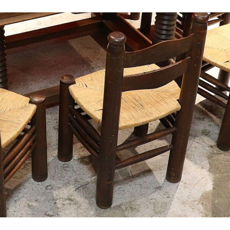 Vintage dining set with 1 table and 8 chairs by Charles Dudouyt in solid oak 1940