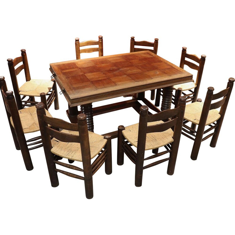 Vintage dining set with 1 table and 8 chairs by Charles Dudouyt in solid oak 1940