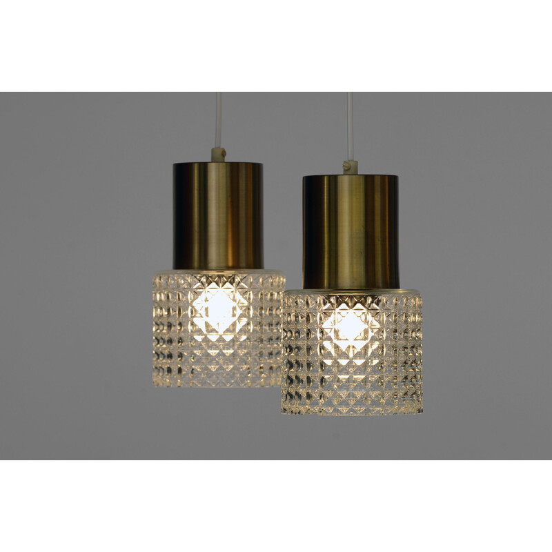 Set of 2 vintage brass pendant lights with glass shades, Sweden, 1960s