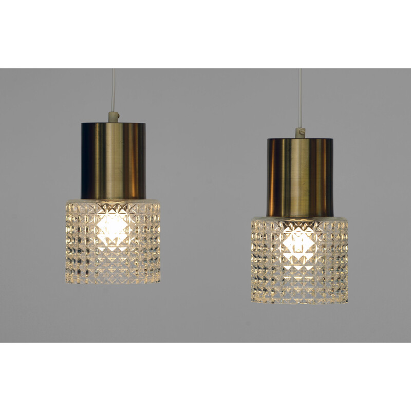 Set of 2 vintage brass pendant lights with glass shades, Sweden, 1960s