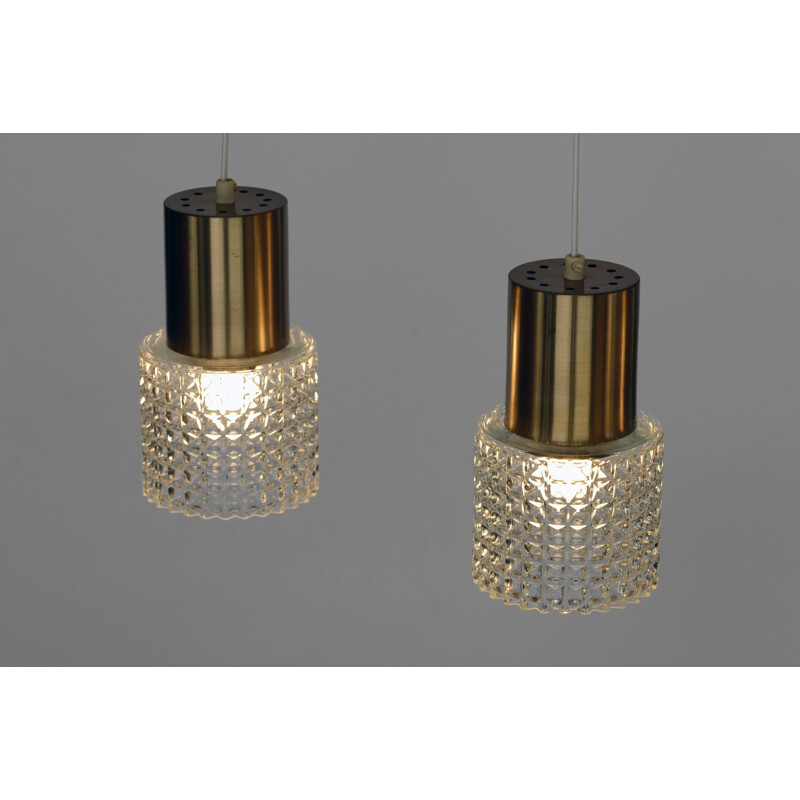 Set of 2 vintage brass pendant lights with glass shades, Sweden, 1960s