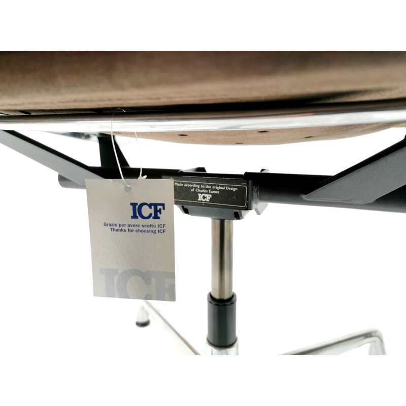 Pair of vintage Eames ICF soft pad aluminium swivel desk armchair 