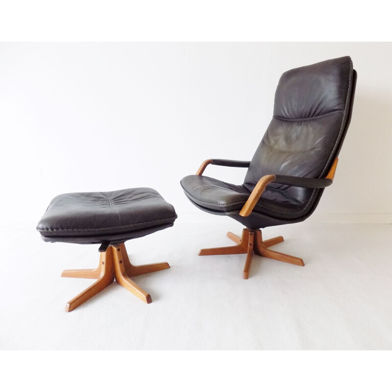 Leather vintage armchair with ottoman by Berg, 1970s