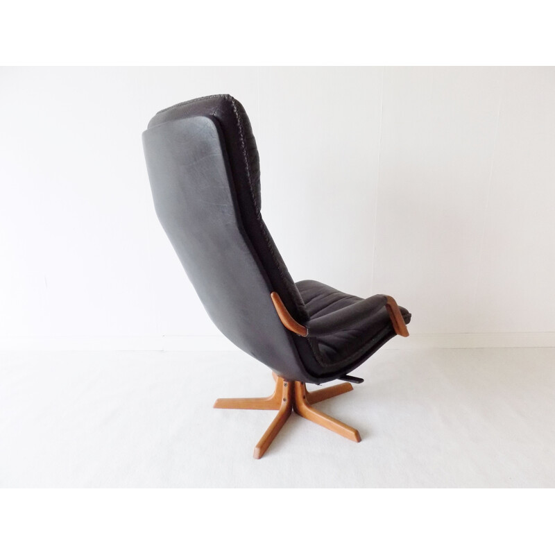 Leather vintage armchair with ottoman by Berg, 1970s