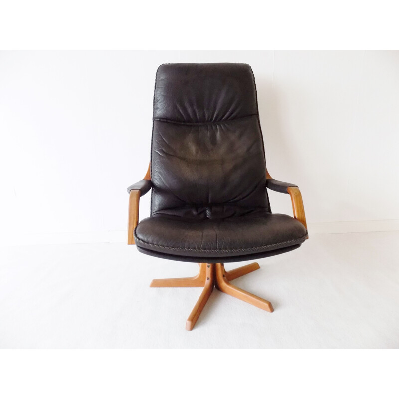 Leather vintage armchair with ottoman by Berg, 1970s