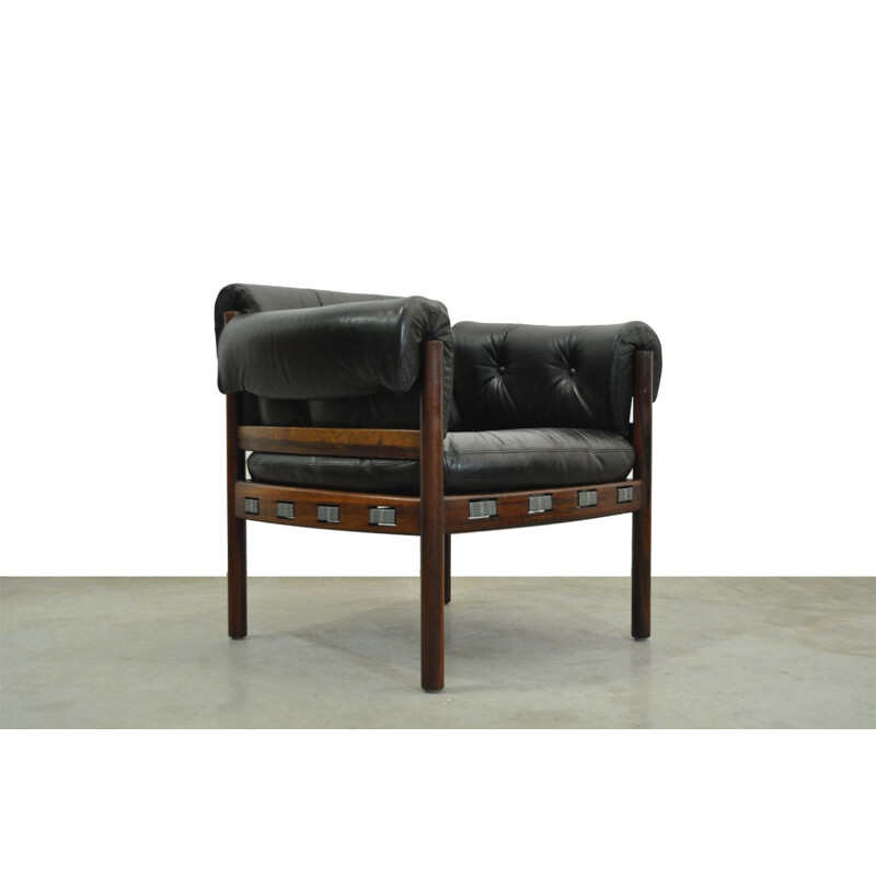 Vintage armchair in black leather from COJA, Sweden, 1960s