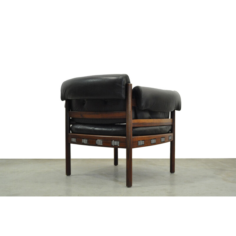 Vintage armchair in black leather from COJA, Sweden, 1960s