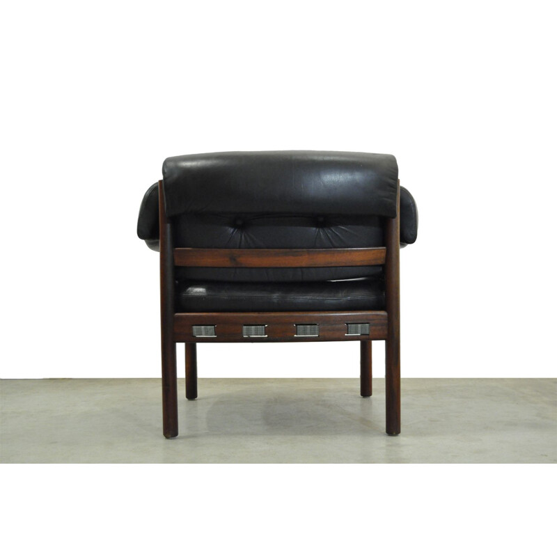 Vintage armchair in black leather from COJA, Sweden, 1960s