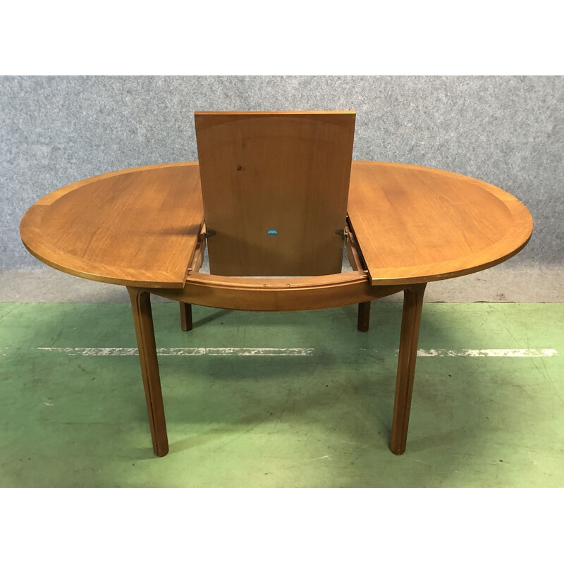 Vintage teak round table with its butterfly extension 1970