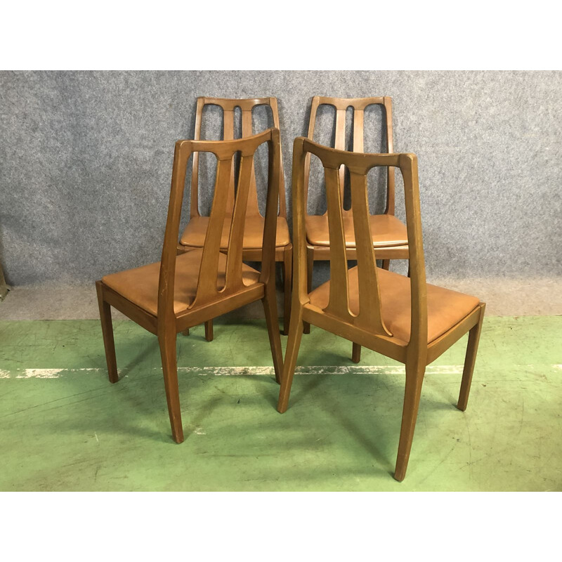Suite de 4 chaises vintage en teck et skaï  1970