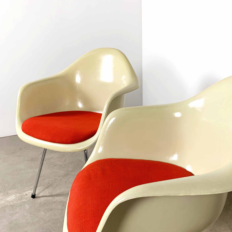 Pair of fiberglass DAX Arm Chairs by Charles & Ray Eames for Herman Miller, 1980s