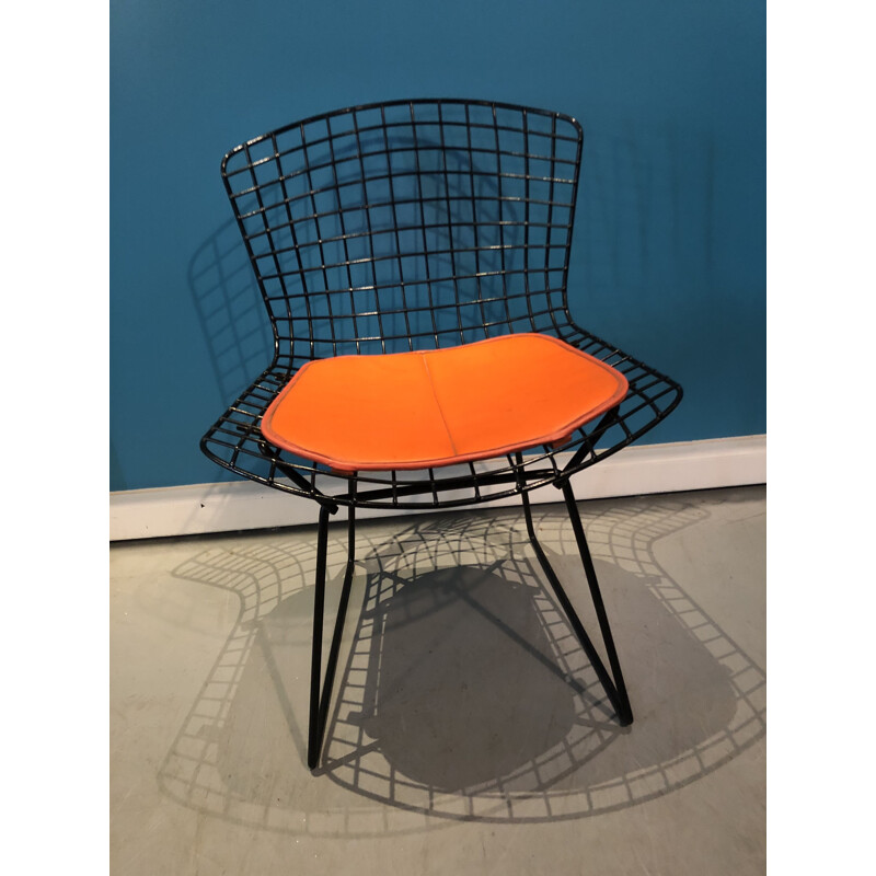 Vintage orange and black chair by Harry Bertoia 