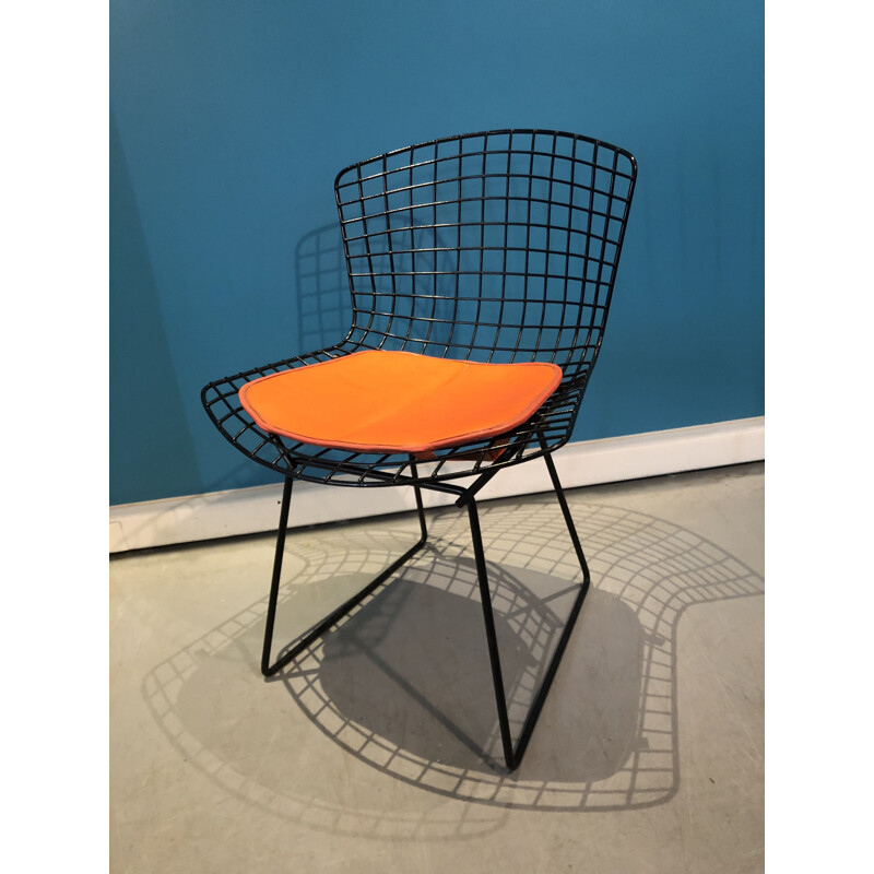 Vintage orange and black chair by Harry Bertoia 