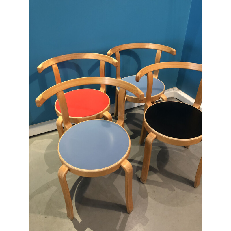 Set of 4 chairs colored by Bruno Matson