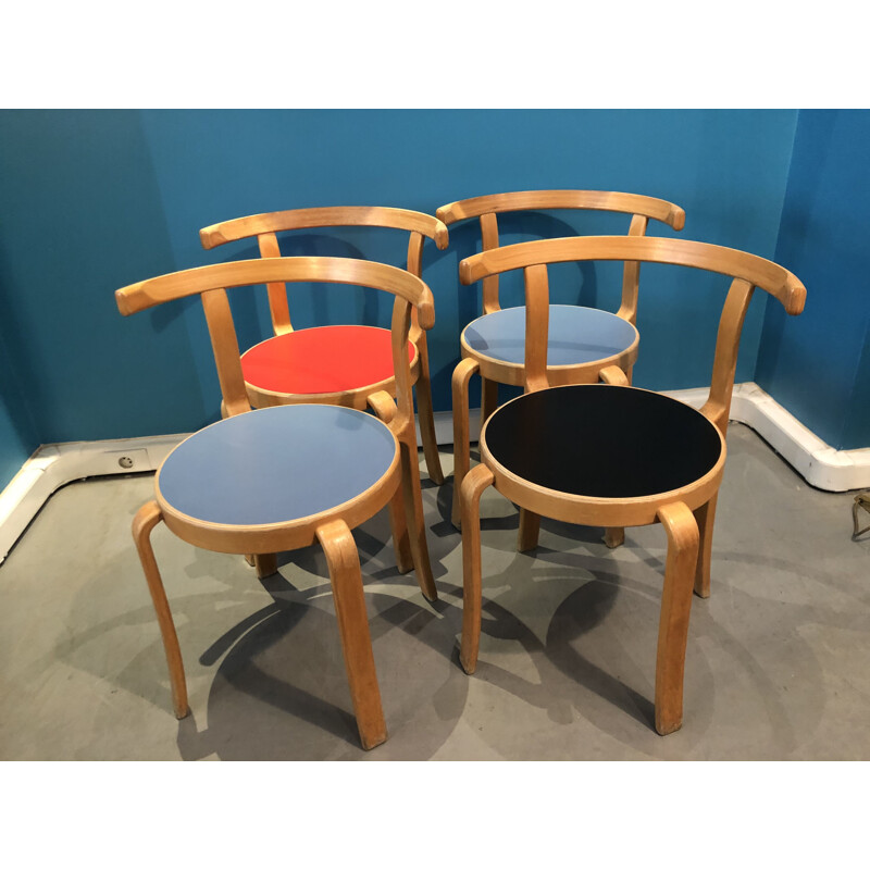 Set of 4 chairs colored by Bruno Matson