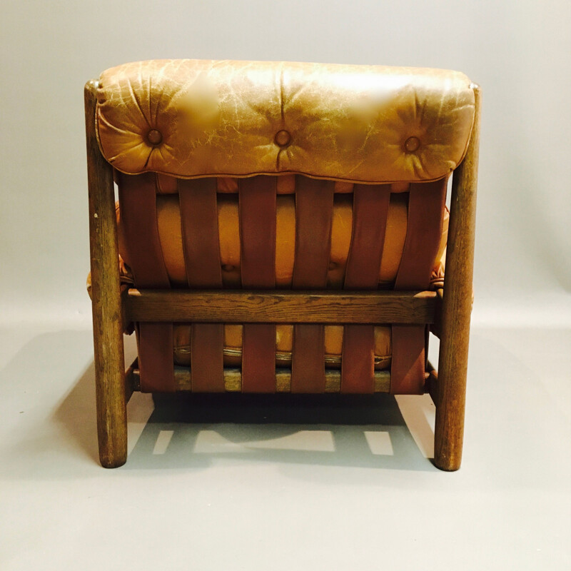 Vintage armchair in yellow leather 1950