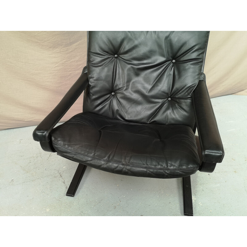 Vintage siesta armchair in leather 1960