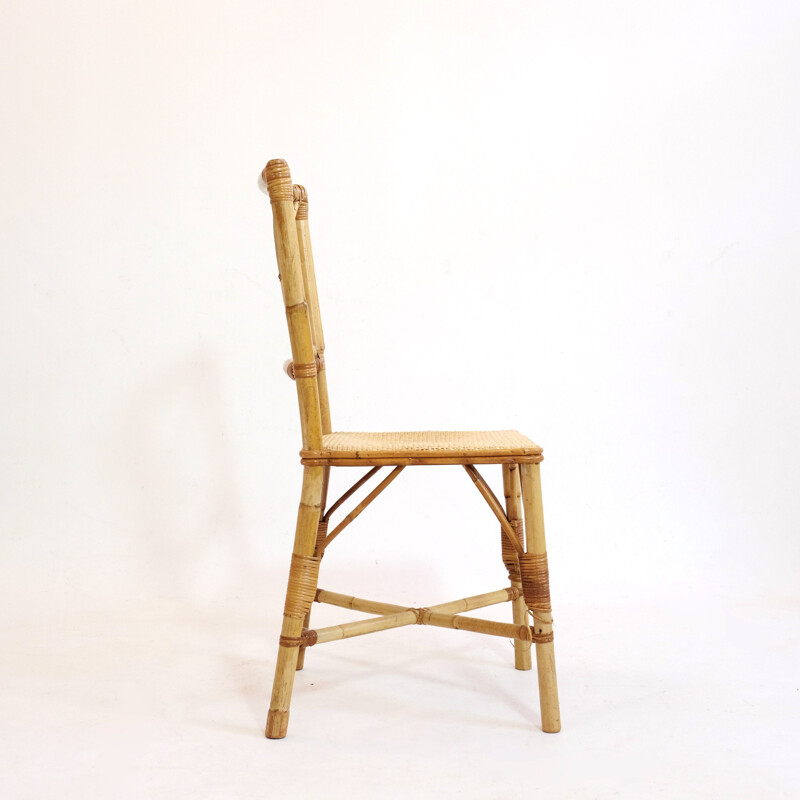 Small vintage chair in rattan from the 60s and 70s