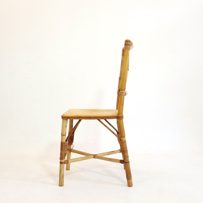 Small vintage chair in rattan from the 60s and 70s