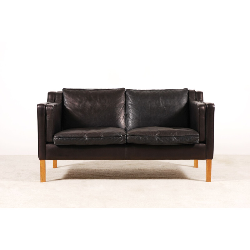 Scandinavian 2-seater vintage sofa in black leather 1960