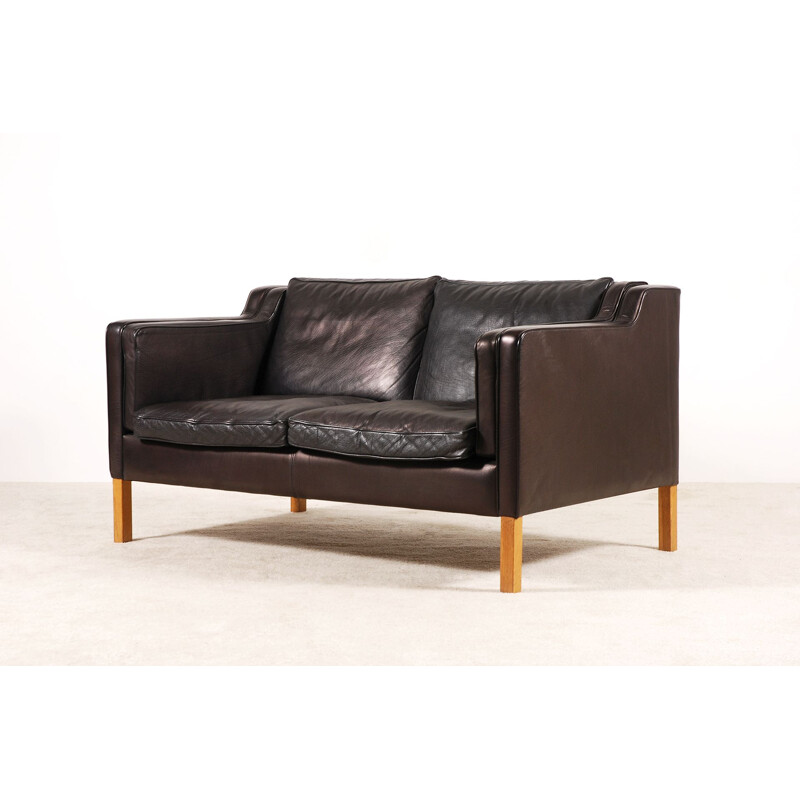 Scandinavian 2-seater vintage sofa in black leather 1960