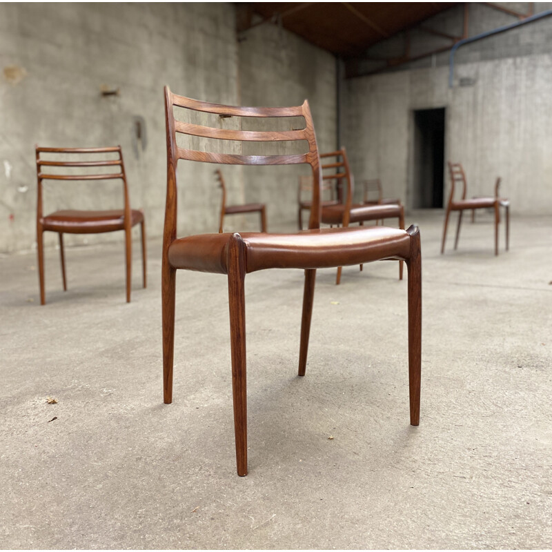 Suite vintage de 8 chaises en Palissandre par Niels otto Moller, 1962