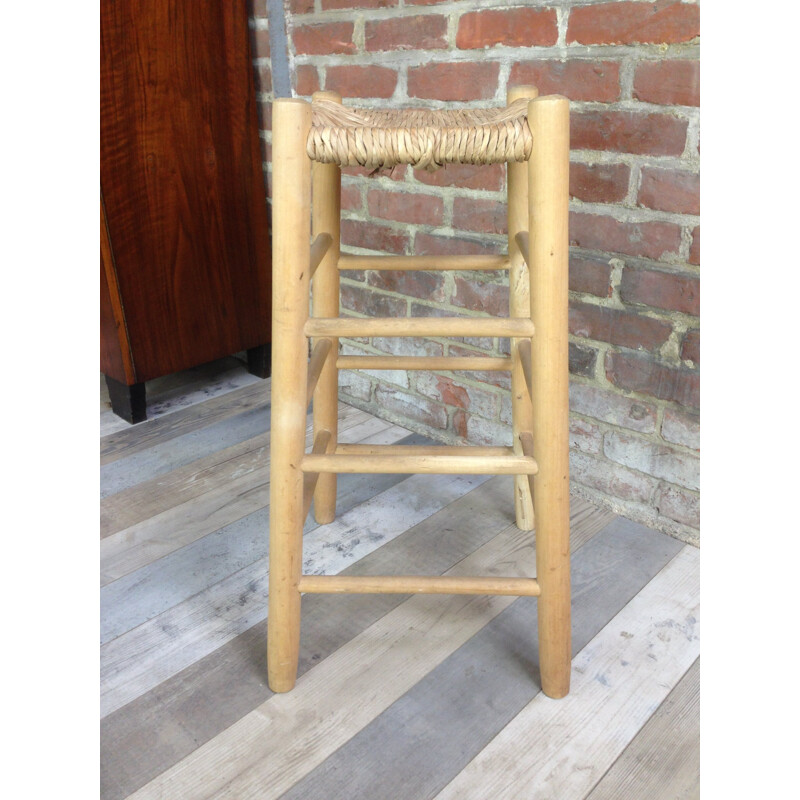 Vintage stool in wood and straw