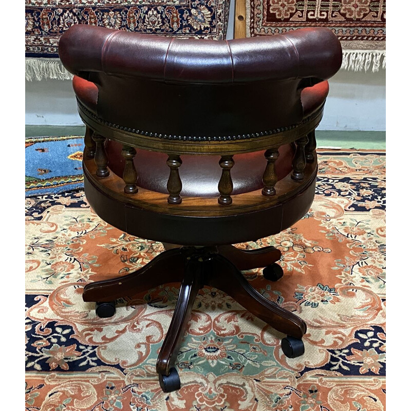 Vintage Chesterfield modern red leather office chair with swivel seat and reclining backrest