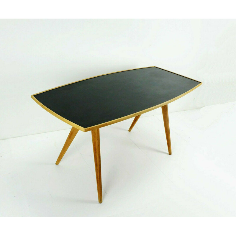 Vintage coffee table in cherry wood and black formica top and slanted legs 