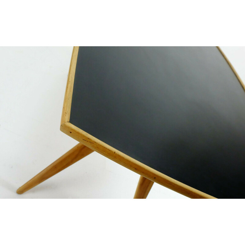 Vintage coffee table in cherry wood and black formica top and slanted legs 