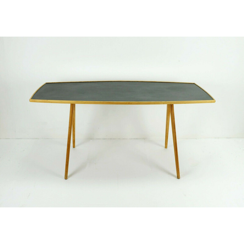 Vintage coffee table in cherry wood and black formica top and slanted legs 