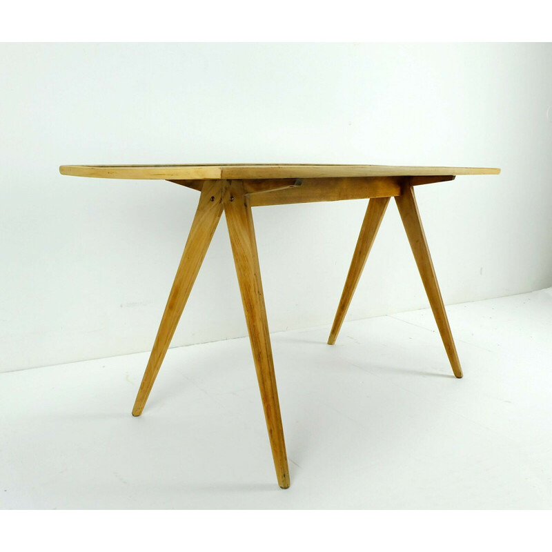 Vintage coffee table in cherry wood and black formica top and slanted legs 