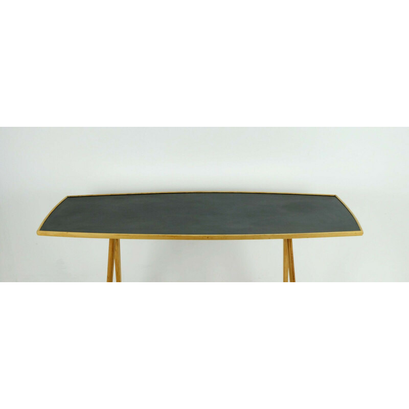 Vintage coffee table in cherry wood and black formica top and slanted legs 