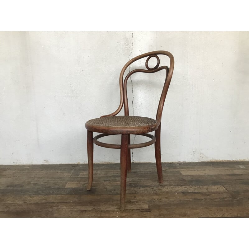 Vintage chair n 31 de THONET in turned wood and cane of origin 1920 