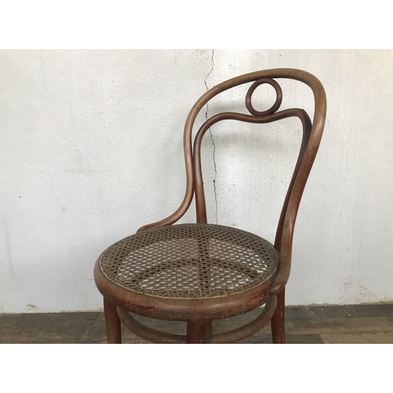 Vintage chair n 31 de THONET in turned wood and cane of origin 1920 