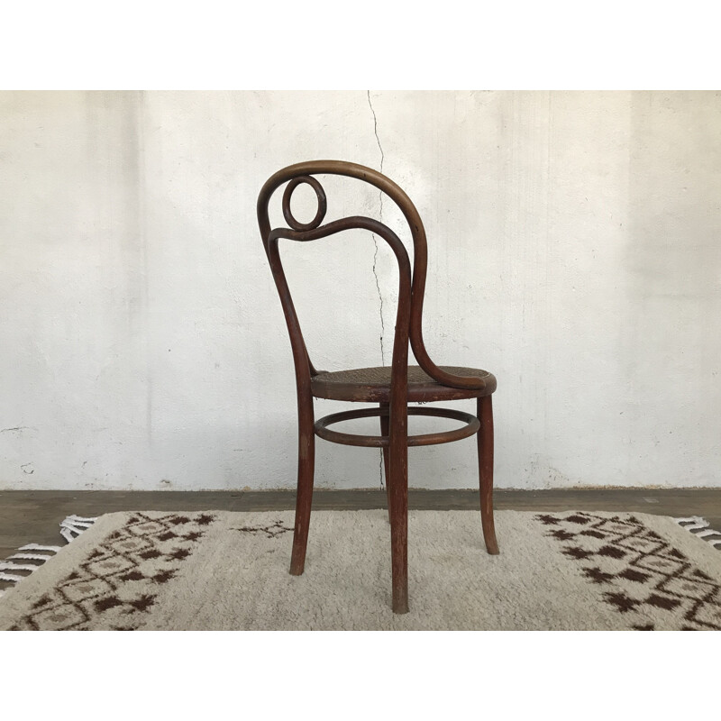 Vintage chair n 31 de THONET in turned wood and cane of origin 1920 