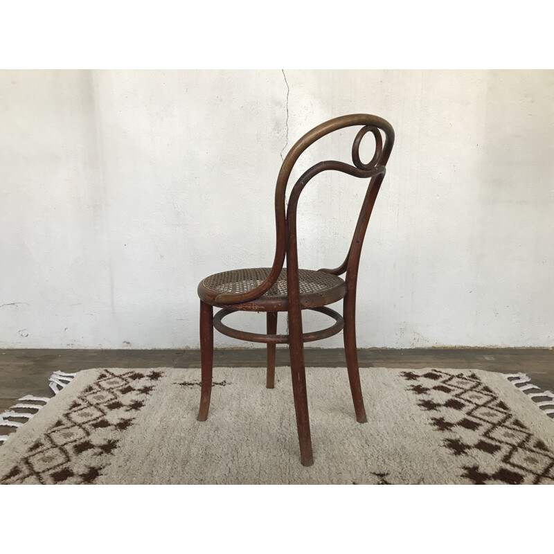 Vintage chair n 31 de THONET in turned wood and cane of origin 1920 