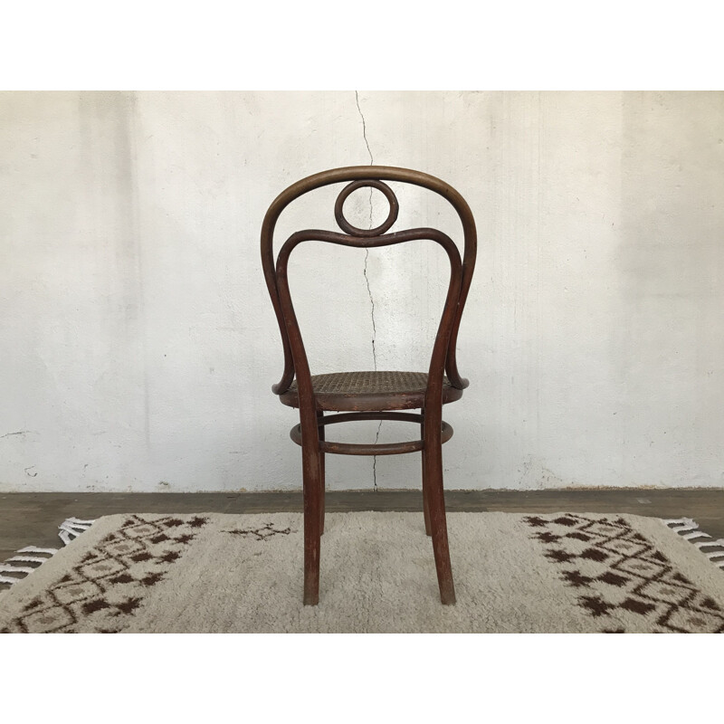 Vintage chair n 31 de THONET in turned wood and cane of origin 1920 
