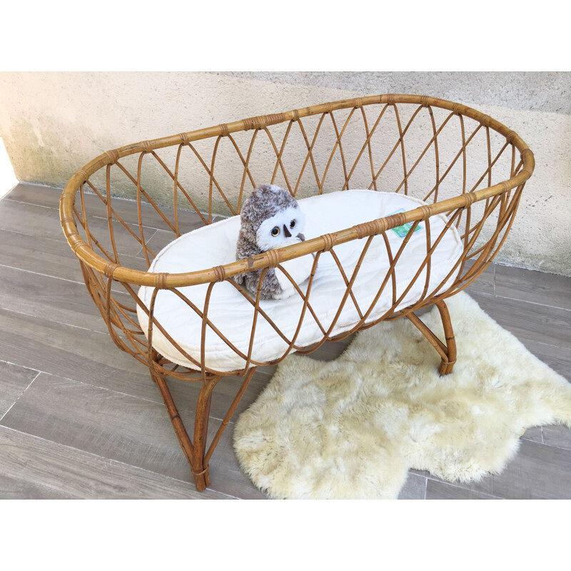 Vintage rattan cradle and organic mattress, France