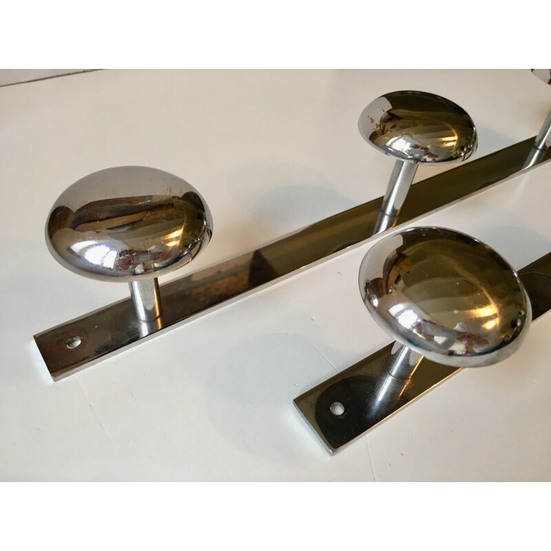 Pair of vintage chrome coat racks