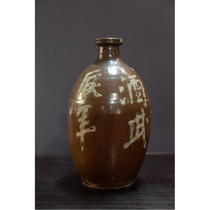 Bottle with vintage ceramic sake