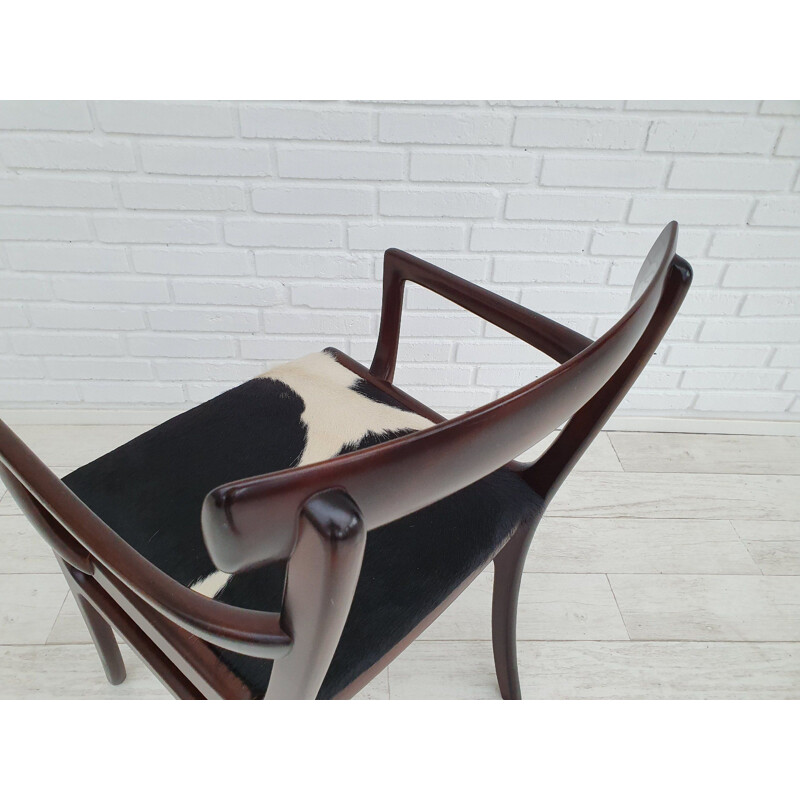 Vintage mahogany and cowskin armchair by Ole Wanscher from PJ Møbler