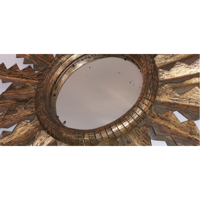 Large carved gilt metal sun mirror, 1950