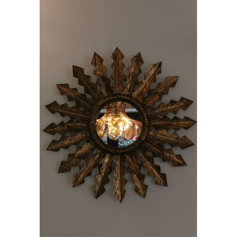 Large carved gilt metal sun mirror, 1950