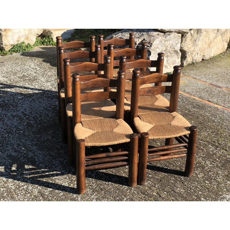 Suite of 8 vintage solid oak chairs by Charles Dudouyt, 1940s