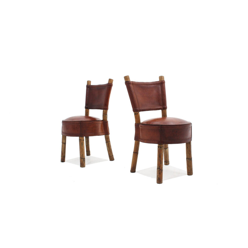 Lot de 2 chaises Vintage en cuir et rotin