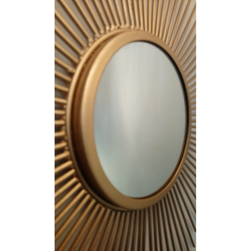 Vintage golden metal sun mirror