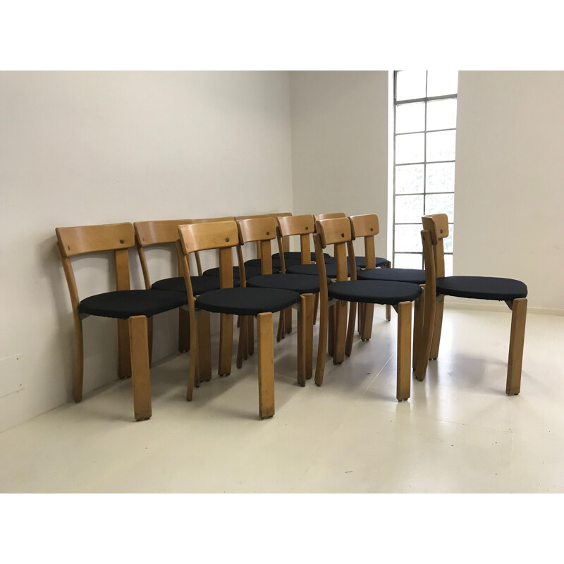 Set of 12 vintage chairs by Bruno Rey