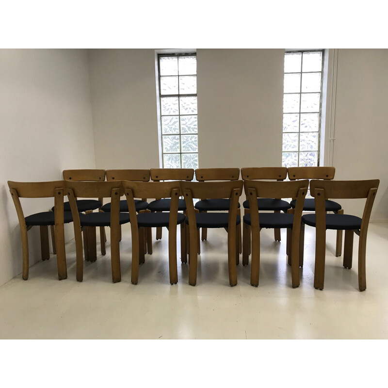 Set of 12 vintage chairs by Bruno Rey