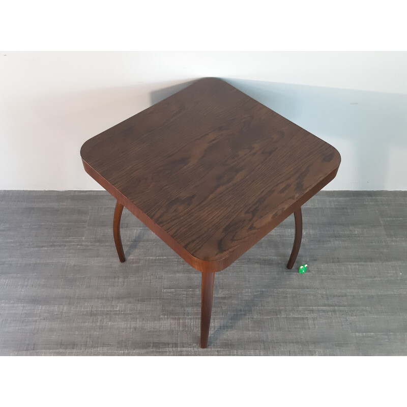 Vintage oak Spider table by Halabala for UP Zavody, 1930s